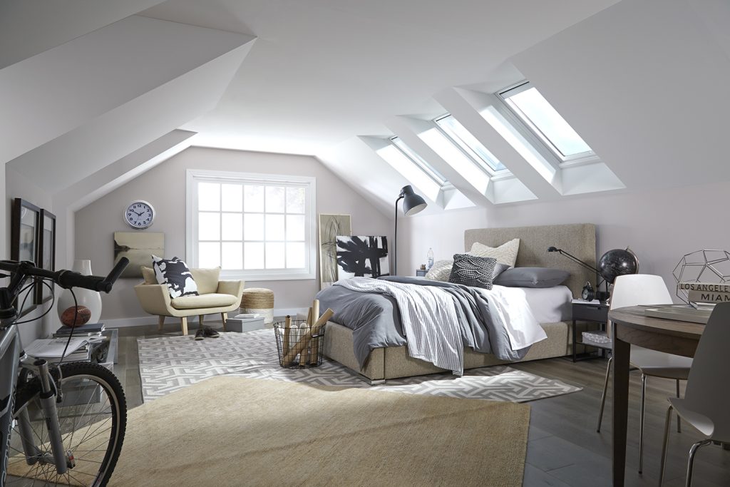 Bedroom with a skylight providing natural light and a relaxing atmosphere