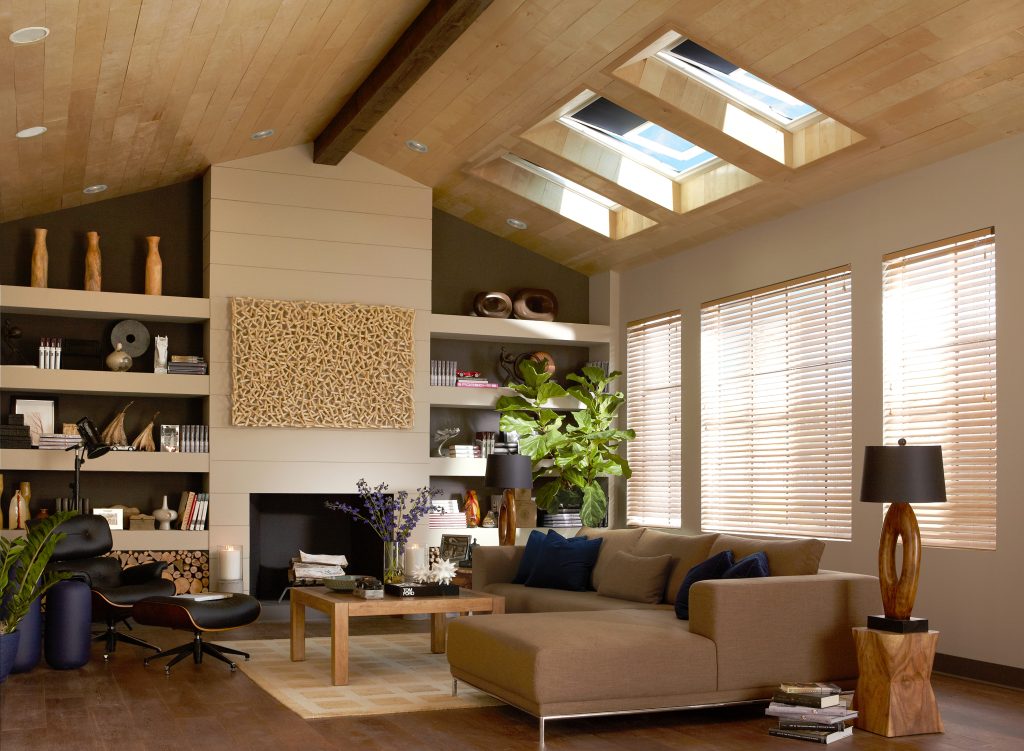 Open living space featuring a skylight that brings in natural light